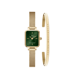 Daniel WellingtonのQuadro Mini Evergoldは、エメラルドグリーンの文字盤とゴールドメッシュストラップを組み合わせたスクエア型の腕時計と、ブランドロゴが刻印されたゴールドのClassic Braceletのギフトセットです。