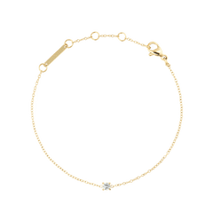 Daniel WellingtonのMirelle Solitaire Bracelet Goldです。極細のゴールドチェーンの中央に、一粒のホワイトキュービックジルコニアが輝きます。ロブスタークラスプとアジャスターリング、ブランドプレートが付属しています。