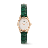 Daniel Wellington Ophelia Miniです。ローズゴールドの楕円形ケースに、ギョーシェ彫りを施したホワイト文字盤とローマ数字のインデックスをあしらい、グリーンのリザード型押しレザーストラップを組み合わせた女性向け腕時計です。