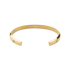 Classic Lumine Bracelet Goldの内側を捉えたアングルの画像です。カフの内側にはDaniel Wellingtonの刻印が施され、両端にはキュービックジルコニアがセットされています。