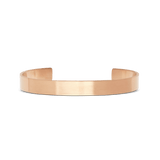 ダニエルウェリントン Line Cuff Brushed Rose Goldの正面プロダクト画像。ブラッシュ仕上げのフラットなバンドが柔らかな光沢を放つ、装飾を排したミニマルなオープンカフデザインです。