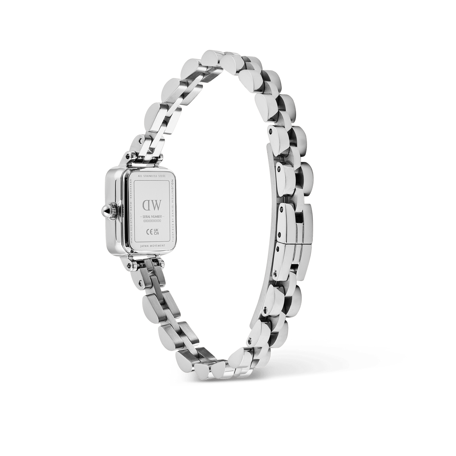 Quadro Mini Arch 3-link Arctic Sunray Silverを裏蓋側から撮影した画像です。ケースバックにはDaniel Wellingtonのロゴやシリアルナンバーが刻印されており、シルバーの3リンクブレスレットが輪を描くように配置されています。