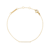 ダニエルウェリントン Mirelle Eternity Bracelet Goldの単体写真です。細いゴールドチェーンの中央に、ホワイトキュービックジルコニアを一列にあしらったエタニティバーを配し、ロブスタークラスプとアジャスターリングも確認できます。