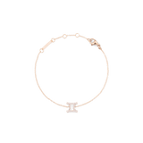 ふたご座のシンボルをクリスタルで表現したチャームが中央にあしらわれた「Crystal Zodiac Chain Bracelet Rose Gold」の全体画像です。白い背景に細身のローズゴールドチェーンを円形に広げ、上部にはアジャスタープレートとロブスタークラスプが見えます。