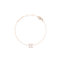 ふたご座のシンボルをクリスタルで表現したチャームが中央にあしらわれた「Crystal Zodiac Chain Bracelet Rose Gold」の全体画像です。白い背景に細身のローズゴールドチェーンを円形に広げ、上部にはアジャスタープレートとロブスタークラスプが見えます。
