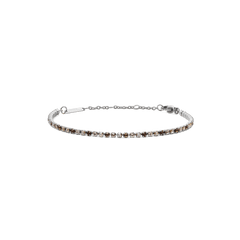 Daniel Wellington Classic Tennis Bracelet Honey Combo Silverの全体画像です。ハニーカラーとクリアのクリスタルが交互に配置された、細身のシルバーチェーンブレスレット。ロブスタークラスプとサイズ調節用のチェーンを備えています。