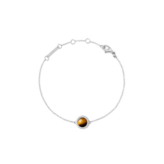 Daniel Wellington Audrey Bracelet Tiger Eye Silverは、琥珀色の美しい縞模様が特徴のドーム型タイガーアイをキュービックジルコニアで囲んだシルバーチェーンブレスレットです。サイズ調節リングとロブスタークラスプを備えています。