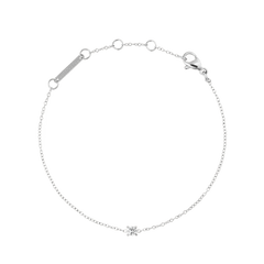 Daniel Wellington Mirelle Solitaire Bracelet Silverの全体像。細身のシルバーチェーンの中央に、4本爪セッティングの一粒キュービックジルコニアが輝くデザインです。ロブスタークラスプとブランドプレートも確認できます。