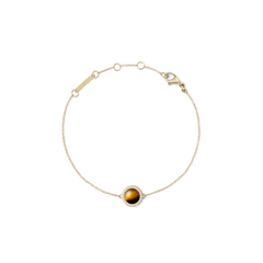 Daniel Wellington Audrey Bracelet Tiger Eye Goldの全体像です。細身のゴールドチェーンの中央に、琥珀色の美しい縞模様が特徴のドーム型タイガーアイカボションを配し、ホワイトキュービックジルコニアのヘイローが縁取ります。ロブスタークラスプとサイズ調節リング付きで、使いやすさも考慮されています。