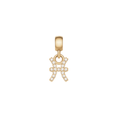 Daniel WellingtonのCrystal Zodiac Charm Goldは、うお座のモチーフをあしらったチャームです。キュービックジルコニアがセットされた魚座のシンボルと、ゴールドのベイル部分が白い背景に美しく映えます。