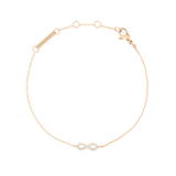 Daniel Wellington Mirelle Infinity Braceletの全体を捉えた画像です。ローズゴールドの細いチェーンの中央に、クリスタルをあしらったインフィニティモチーフが配されています。ロブスタークラスプとブランドプレートも確認できます。白背景で撮影された商品写真です。