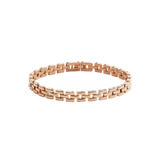 Daniel Wellingtonの3-Link Bracelet ローズゴールドの全体像です。規則的に連なる3連リンクは、ポリッシュ仕上げが光を受けて上品な輝きを放ちます。クラスプ部分も確認できるプロダクトカットです。