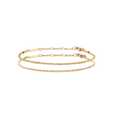 ダニエルウェリントン Staple Bracelet Set Gのゴールドカラー2本セットです。ツイストチェーンとボックスチェーンを組み合わせ、異なる質感の輝きが重なるレイヤードスタイルをお楽しみいただけます。