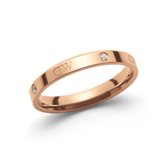 Daniel Wellington Classic Lumine Ring Rose Goldの単体プロダクト画像。細身のローズゴールドバンドにロゴのエッチングとフラットに埋め込まれたクリスタルが交互に配置された、ミニマルなデザインです。
