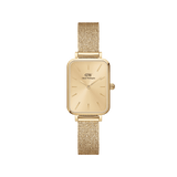 Daniel Wellington Quadro Pressed Unitone Goldの正面画像です。スクエア形状のゴールドケースに、サンレイ仕上げのゴールドダイヤル、同色のバーインデックスと針を組み合わせ、プレス加工のゴールドメッシュストラップと一体感のあるデザインに仕上げています。