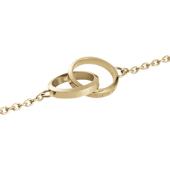 Elan Unity Braceletのインターロッキングモチーフ部分を拡大したディテール画像です。ゴールドPVDコーティングを施した2つのリングが重なり合い、内側にはDaniel Wellingtonの文字が刻印されています。