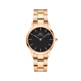 Daniel Wellington Iconic Link Black Rose Goldの正面画像。ブラックの文字盤にローズゴールドのバーインデックスと針が映え、3ピースリンク構造のローズゴールドブレスレットが一体感のあるデザインを演出しています。