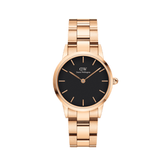 Daniel Wellington Iconic Link Black Rose Goldの正面画像。ブラックの文字盤にローズゴールドのバーインデックスと針が映え、3ピースリンク構造のローズゴールドブレスレットが一体感のあるデザインを演出しています。