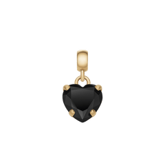 Daniel Wellington Heart Black Crystal Charm Gは、多面カットのブラッククリスタルを5本のゴールド爪で留めたハート型チャームをアップで捉えた画像です。